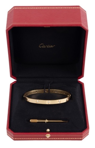 Second Ladies or Gents Cartier Love Bracelet in 18K Yellow Gold and 10 Diamonds Totaling Shy of One Carat.