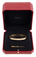 Second Ladies or Gents Cartier Love Bracelet in 18K Yellow Gold and 10 Diamonds Totaling Shy of One Carat.