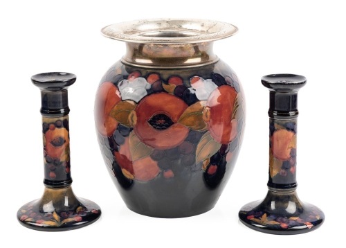 Antique Moorcroft Earthenware: Large Art Pottery Vase with Matching Candlesticks in the Peaches and Grapes Pattern. 1950
