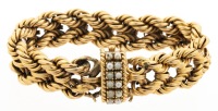 Ladies 14K Yellow Gold "Braided" Bracelet with Tiny South Sea Pearl Studded Clasp