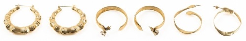 Three Pairs of 14K Yellow Gold Earrings Including a Swell Pair of Hammered Snake Earrings