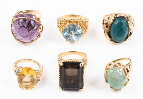 Collection of Six Fabulously Chunky Rings all in 14K Yellow Gold and Include a Carved Amethyst, also Jade, Topaz and Mal