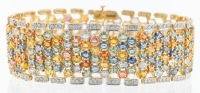 Multi-Colored Fancy Sapphires and Diamond Bracelet. 43 Carats of Natural, Colorful Sapphires in 14K Yellow Gold Bracelet