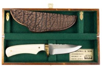 S. Mackrill & Son Fixed Blade Knife. Scales in Highly Polished Bone with a Buffalo Hide Sheath