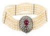 Pearl Bracelet with 10K White Gold Oversized Clasp Centered with a Mud Ruby Cabochon.