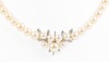 Lovely Necklace of Graduated, Lustrous White Pearls with a 7 Pearl Array in the Centerpiece with a Bright Polish Finish