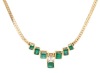 Exceptional Emerald and Diamond Necklace in 14K Yellow Gold Herringbone Chain with 7 Channel Set Emeralds and a Beautful