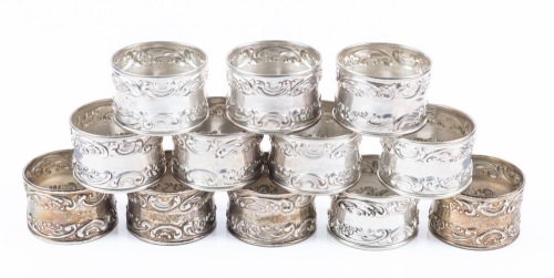 Twelve (12) Matching Sterling Silver Napkin Rings with Two Rows of Foliate Designs