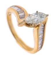 Ladies 14K Yellow Gold .30 Carat Diamond with Baguette Cut Diamonds Flanking the Center Stone
