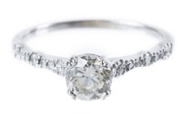 Fine Ladies Engagement Ring Centered with a High Profile Prong.75 Carat Brilliant Cut Natural Diamond in 14K White Gold