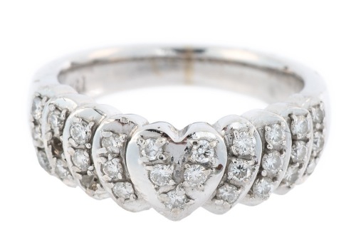 Ladies 18K White Gold Ring with Heart Shaped Center Studded with Accent Diamonds.