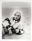 Marilyn Monroe "Laying on sand at Santa Monica Beach," by George Barris