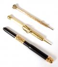 Two Gold Pencils And One Gold Trimmed Fountain Pen