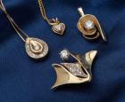 Collection of 4 Diamond, 14K Yellow Gold Pendants