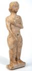 ROMAN. Limestone figure of nude Venus standing on square base