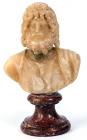 ROMAN. Alabaster bust of Zeus Serapis after the Hellenistic statue by Bryaxis