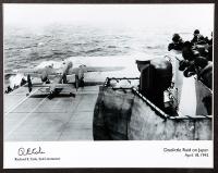 Photo of Jimmy Doolittles B-25 taking off the USS Hornet. Autographed by Richard Cole, Co-pilot