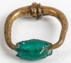 Roman Period Green Glass and Bronze Ring, circa AD 200-400