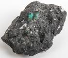 An Uncleaned Rock with Two Embedded Emeralds from St. Augustine, Florida