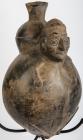 A Black Chavin Standing Effigy Pot - Pre-Columbian, circa 100 B.C.