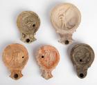 Five Roman Gladiator Discus Lamps, c. 2nd-3rd Century AD