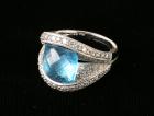 Lady's Blue Topaz, Diamond, 18K White Gold Band Ring