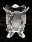 A vintage footed coin glass vase