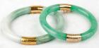 Two Jade Bangle Bracelets with Gold Hinge and Clasp