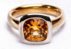 18 Kt. Gold and Brilliant Orange Topaz Ring