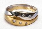 18 Kt. Yellow and White Gold Ring Set with Five Diamonds