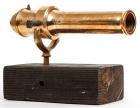 AN ANTIQUE BRASS/BRONZE PERCUSSION SIGNAL CANNON