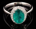 Lady's 14K White Gold Cocktail Ring with 3 Carat Oval Cut Emerald and Diamond Accents