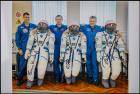 Soyuz MS-02 Oversized, Crew Signed Color Portrait Aside Space Suits