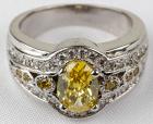 Beautiful Lady's 1.2 Carat Oval Yellow Diamond, 18K White Gold Band Style Ring