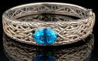 Outstanding Lady's Sterling Silver and Blue Topaz Hinged Bangle by EFFY