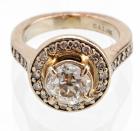 Lady's 14K White Gold Ring with 1ct. Old Mine Cut Diamond Inside Round Halo