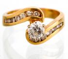 Lady's 14K Yellow Gold Diamond Solitaire Accented with Channel Set Diamonds