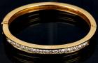 Lovely Lady's 14K Yellow Gold and 2 1/2 Carat Total Diamond Bangle Bracelet