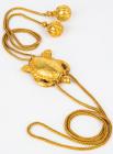 Striking Majapahit Gold Necklace of a Sea Turtle, Slide with Bobble Head, Barrel Weave Chain and Fruit Blossom Pendant Tips