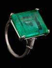 Stunning Platinum and Columbian 10 Carat Natural Emerald Ring Flanked by Two Taper Baguettes