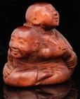 Japanese Netsuke: Terrific 19th Century Boxwood Carving of Masseur Signed by Tanako Minko